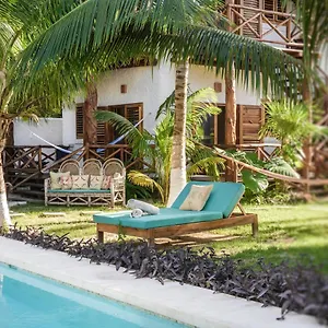 casa-blanca-isla-holbox.quintano-roohotels.com/